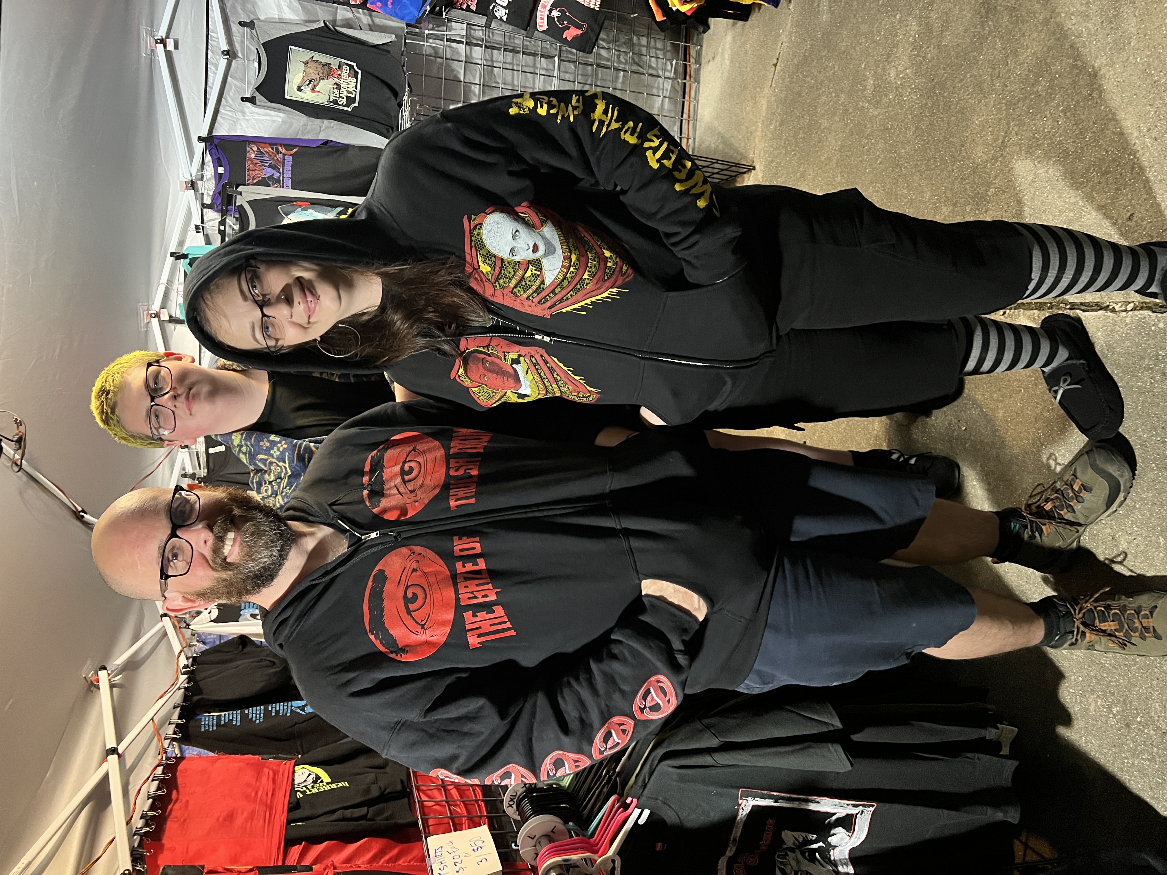 Fans wearing LIX horror hoodies at convention