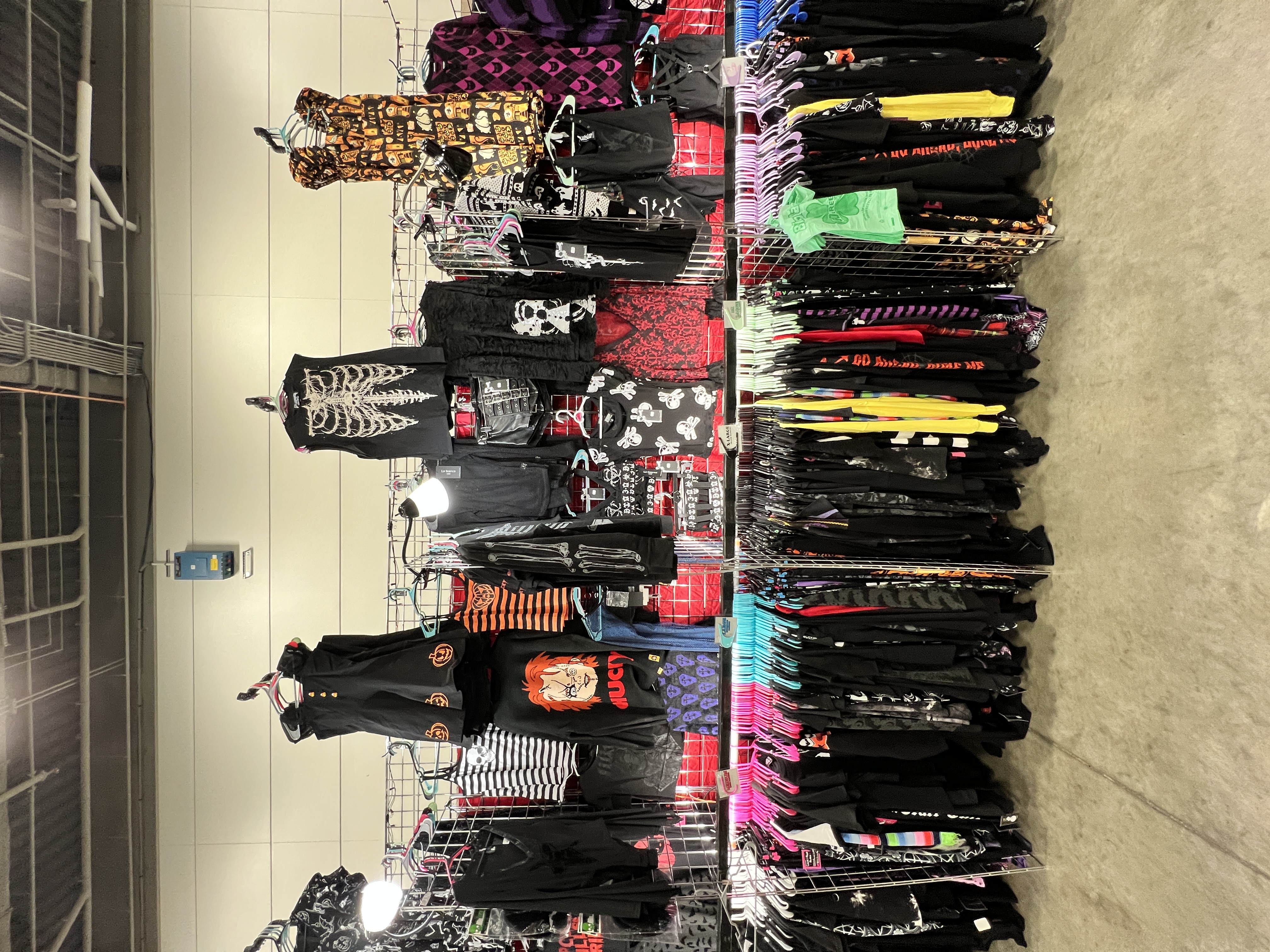 LIX convention booth — dresses and t-shirts