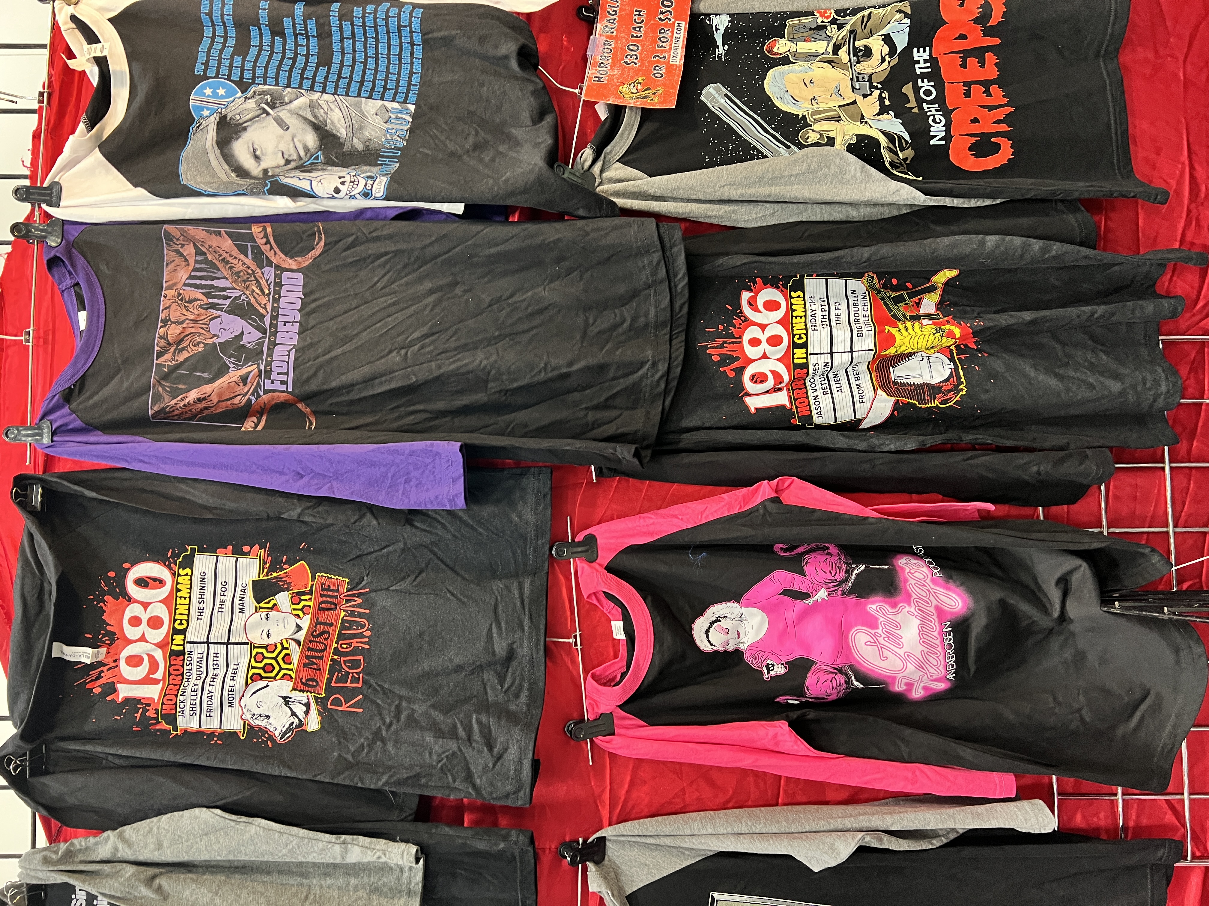LIX horror hats wall display at convention